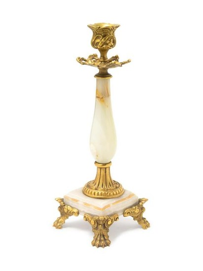 A French Gilt Metal and Onyx Candlestick