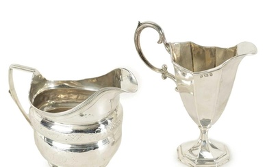 A GEORGE III SILVER MILK JUG OF OBLATE FORM with bright cut ...