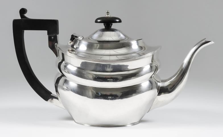 A George V Silver Oval Tea Pot, maker's mark...