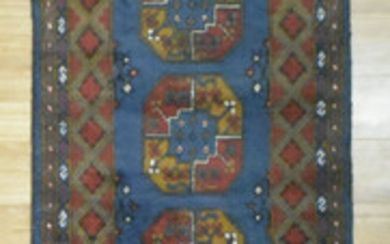 A HANDKNOTTED PURE WOOL AFGHAN TURKOMAN RUNNER