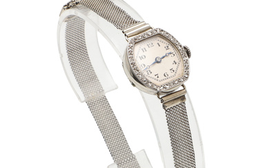 A LADY'S 18CT GOLD AND DIAMOND COCKTAIL WATCH.