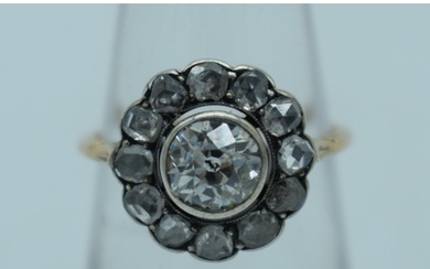 A LARGE ANTIQUE GOLD AND DIAMOND COCKTAIL CLUSTER RING. L. 2...