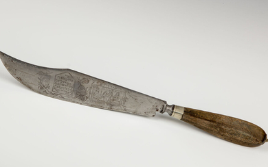 A LARGE BUTCHER KNIFE. Continental, 20th century. With later...
