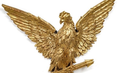 A LARGE CENTENNIAL PERIOD CARVED AND GILDED WOOD EAGLE