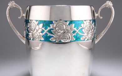 A LARGE GERMAN ART NOUVEAU SILVER-PLATED AND ENAMEL ICE