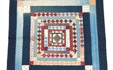 A Large Late 19th Century Quilt, worked in frames and...