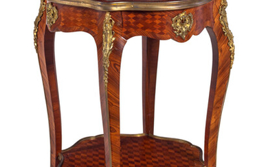A Louis XV Style Gilt Bronze Mounted Kingwood and Parquetry Guéridon