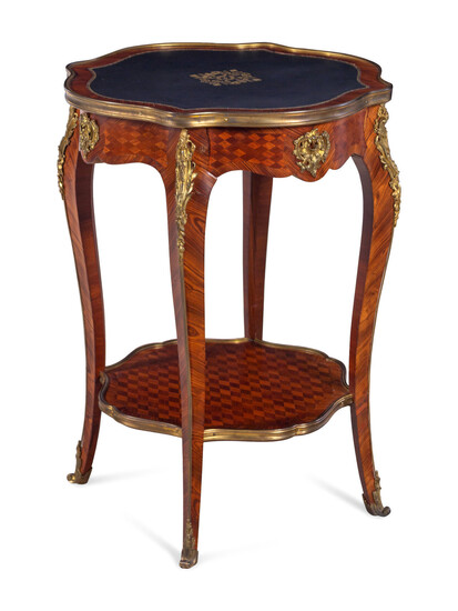 A Louis XV Style Gilt Bronze Mounted Kingwood and Parquetry Guéridon
