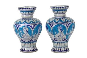 A NEAR PAIR OF MULTAN TURQUOISE AND BLUE POTTERY VASES