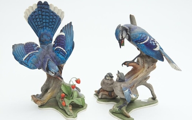 A PAIR OF BOEHM BLUE JAY BISQUE PORCELAIN FIGURES, 34.5 AND 31 CM HIGH