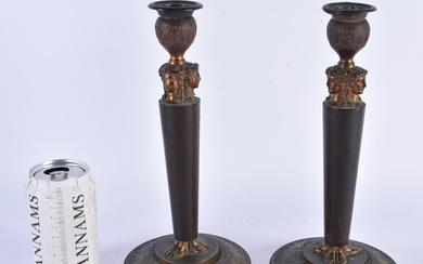 A PAIR OF EARLY 19TH CENTURY FRENCH BRONZE TRIPLE MASK CANDL...