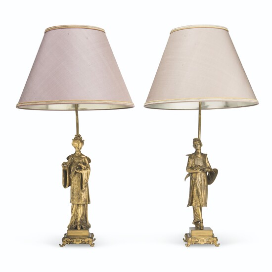 A PAIR OF FRENCH GILT-BRONZE FIGURES MOUNTED AS LAMPS