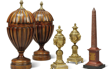 A PAIR OF ORMOLU CASSOLETTES, A RED MARBLE OBELISK AND A PAIR OF RIBBED MAHOGANY URNS AND COVERS, 19TH-20TH CENTURY