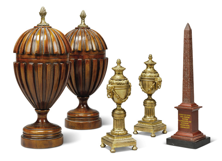 A PAIR OF ORMOLU CASSOLETTES, A RED MARBLE OBELISK AND A PAIR OF RIBBED MAHOGANY URNS AND COVERS, 19TH-20TH CENTURY