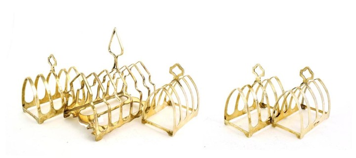 A Pair of George V Silver Toast-Racks and a Pair...