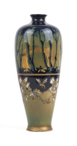 A Riessner-Stellmacher-Kessel high shoulder vase, early 20th century, decorated with a sunset forest scene with trees and gilded enameled flowers and dragonflies, printed mark to base, 32.7cm high (VAT charged on hammer price)