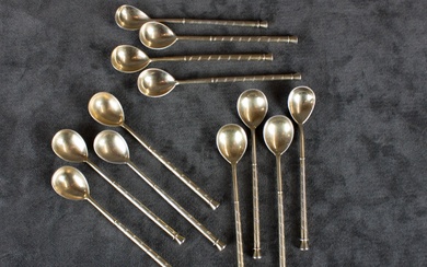 A SET OF TWELVE RUSSIAN SILVER SPOONS