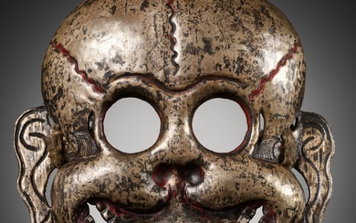 A SILVER REPOUSSÉ MASK OF A CHITIPATI, TIBET, 18TH-19TH CENTURY
