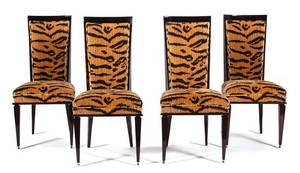 A Set of Four Art Deco Style Black Lacquer Dining Chairs