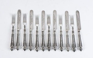 A VICTORIAN SILVER SET OF FRUIT KNIVES AND FORKS