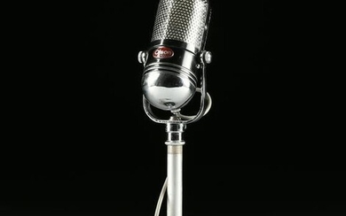 A VINTAGE JAPANESE OLSON M-102 PILL MICROPHONE ON