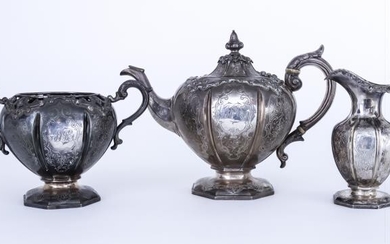 A Victorian Scottish Silver Three-piece Tea Service, by J.M....