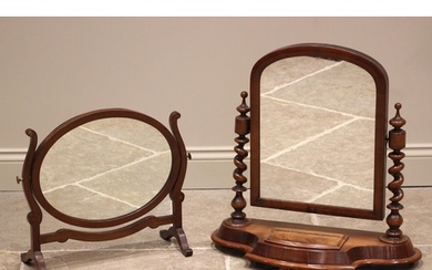 A Victorian mahogany dressing table mirror, the arched mirro...