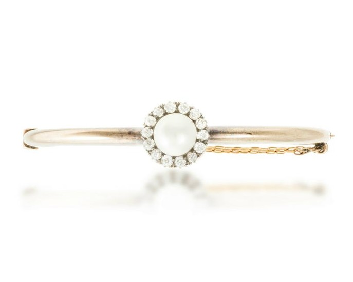 A Victorian pearl and diamond bangle bracelet