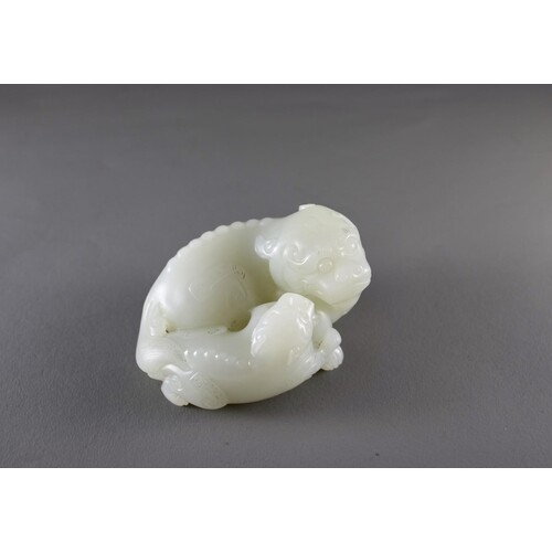 A celadon Jade 'Beasts' Group, 18th CenturyL: 8cm, H: 5cm A...