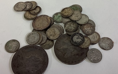 A collection of silver coins.