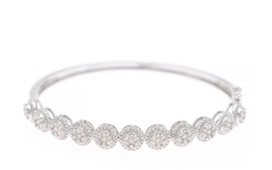 A diamond bangle set with numerous brilliant-cut diamonds weighing a total of app. 1.79 ct., mounted in 18k white gold. Diam. app. 5.6×4.8 cm.