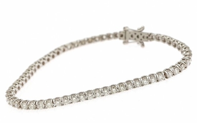 A diamond bracelet set with numerous brilliant-cut diamonds totalling app. 5.50 ct., mounted in 18k white gold. Colour: H. Clarity: SI. L. 17.6 cm.