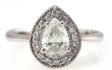 A diamond ring set with a pear-shaped brilliant-cut diamond weighing app. 0.90...