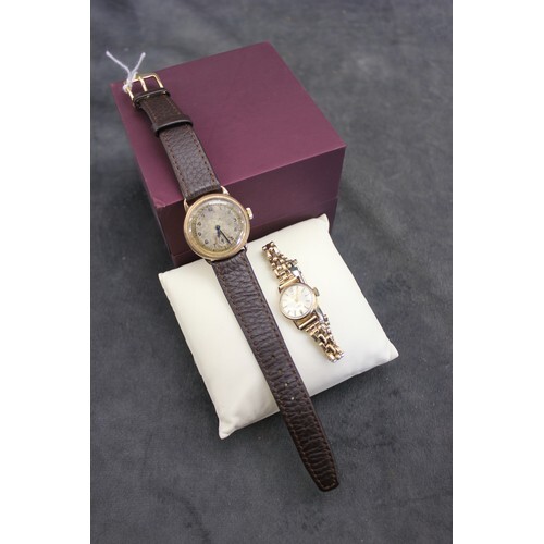A lady's "Verity" 9ct gold wrist watch, on rolled gold strap...