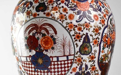 A large Japanese baluster vase in the Imari palette, with...