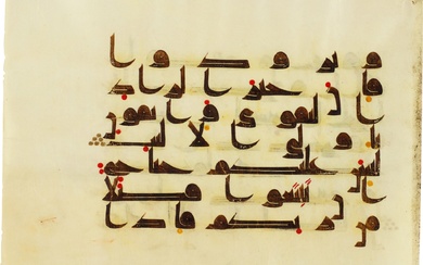 A large Qur'an leaf in Kufic script on vellum, North...
