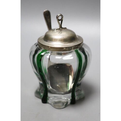 A late Victorian Art Nouveau silver mounted green and clear ...