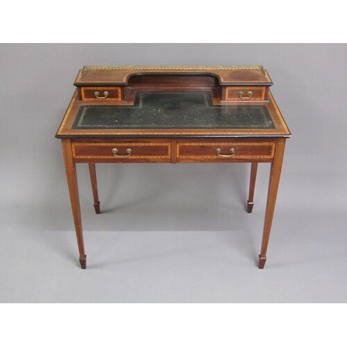 A late Victorian Maple & Co mahogany line inlaid and crossba...