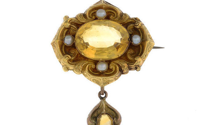 A late Victorian gold citrine and split pearl brooch.