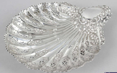 A late Victorian silver dish in the form of a scallop shell.