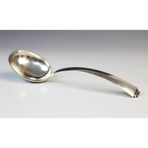 A mid-20th century Danish 830S silver soup spoon, oval bowl ...