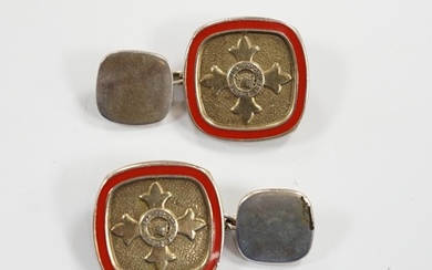 A modern pair of silver and red enamel cufflinks, embossed w...