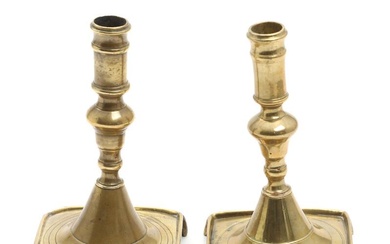 A pair of 18th century Spansish patinated brass candlestick holders, baluster shaped...