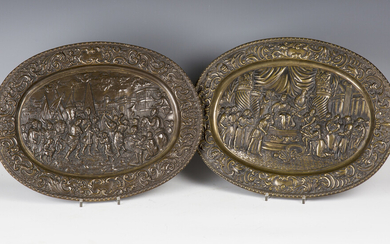 A pair of 19th century Continental cast bronze oval ornamental plaques, both depicting Classical sce