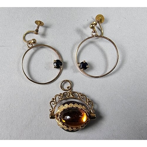 A pair of 9ct gold sapphire earrings and a 9ct swivel seal