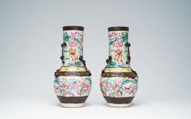 A pair of Chinese Nanking crackle glazed famille rose 'warrior' vases with dragons chasing the...