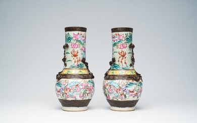 A pair of Chinese Nanking crackle glazed famille rose 'warrior' vases with dragons chasing the