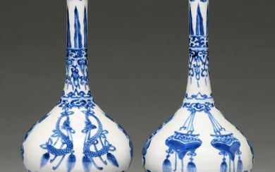 A pair of Chinese blue and white bottle vases, Kangxi period...