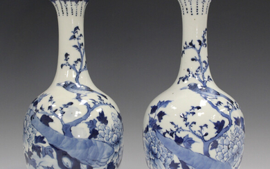 A pair of Chinese blue and white porcelain bottle vases, late 19th century, each ovoid body and flar
