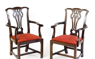 A pair of Chippendale style mahogany elbow chairs with a dro...